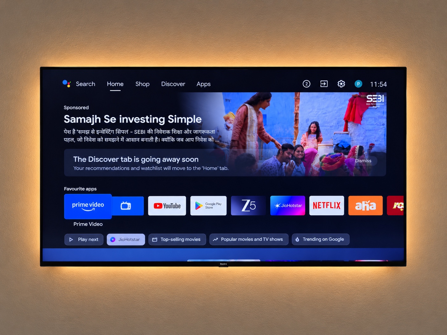 Stock Google TV home with a sponsored ad