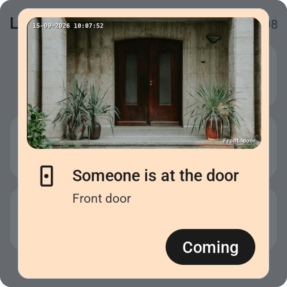 The same camera in an alert: its picture across the top of the card, with the card's rounded corners