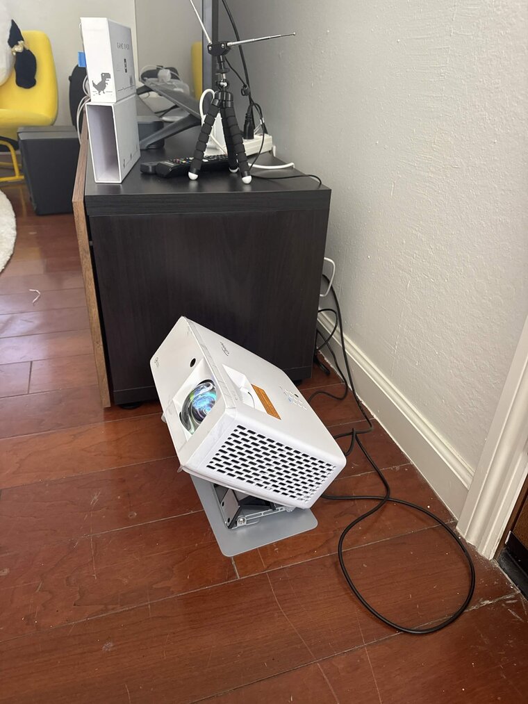 The build: short-throw projector pointing up at the ceiling, RTL-SDR dipole antenna on the cabinet