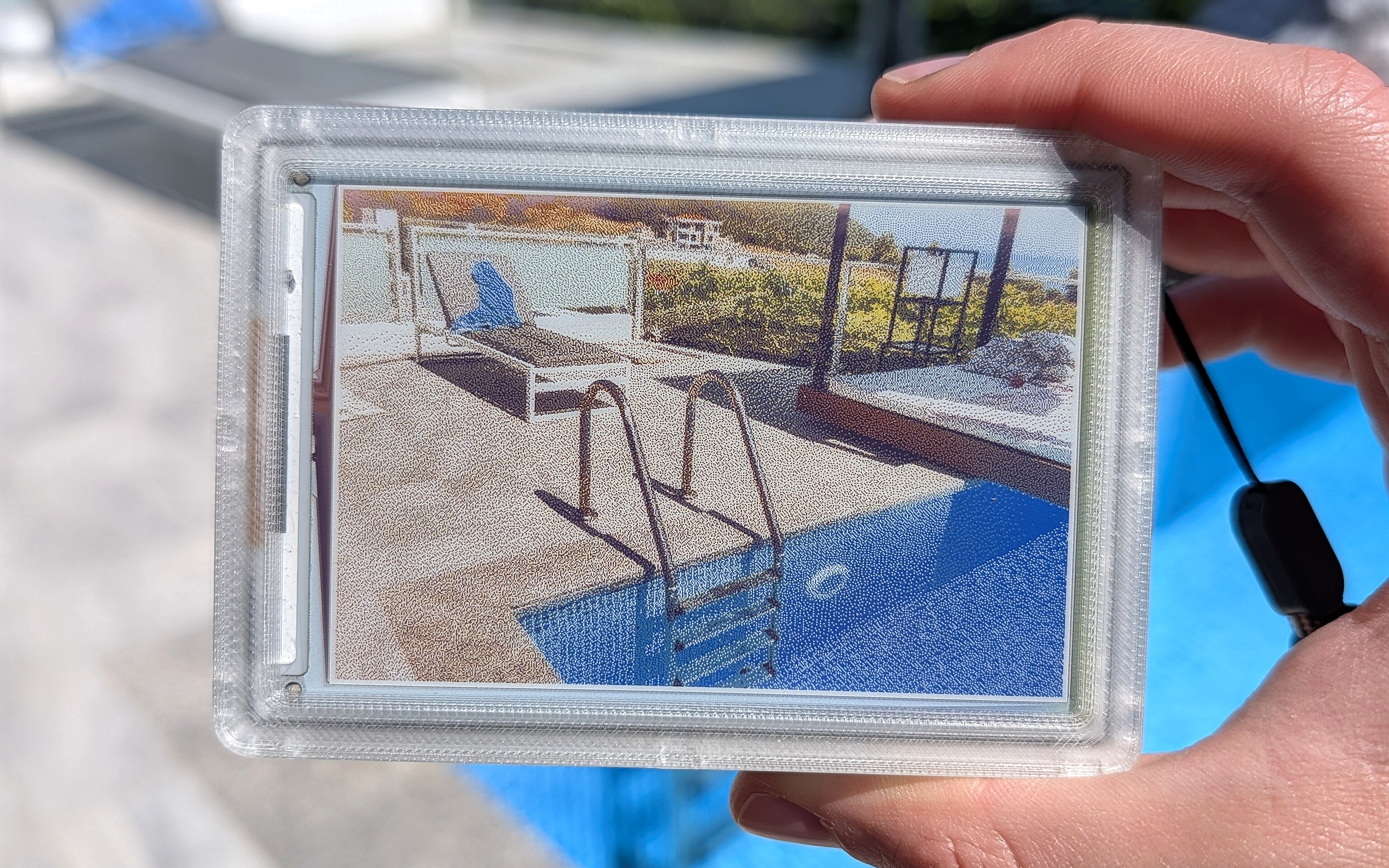 reFrame ePaper camera in hand