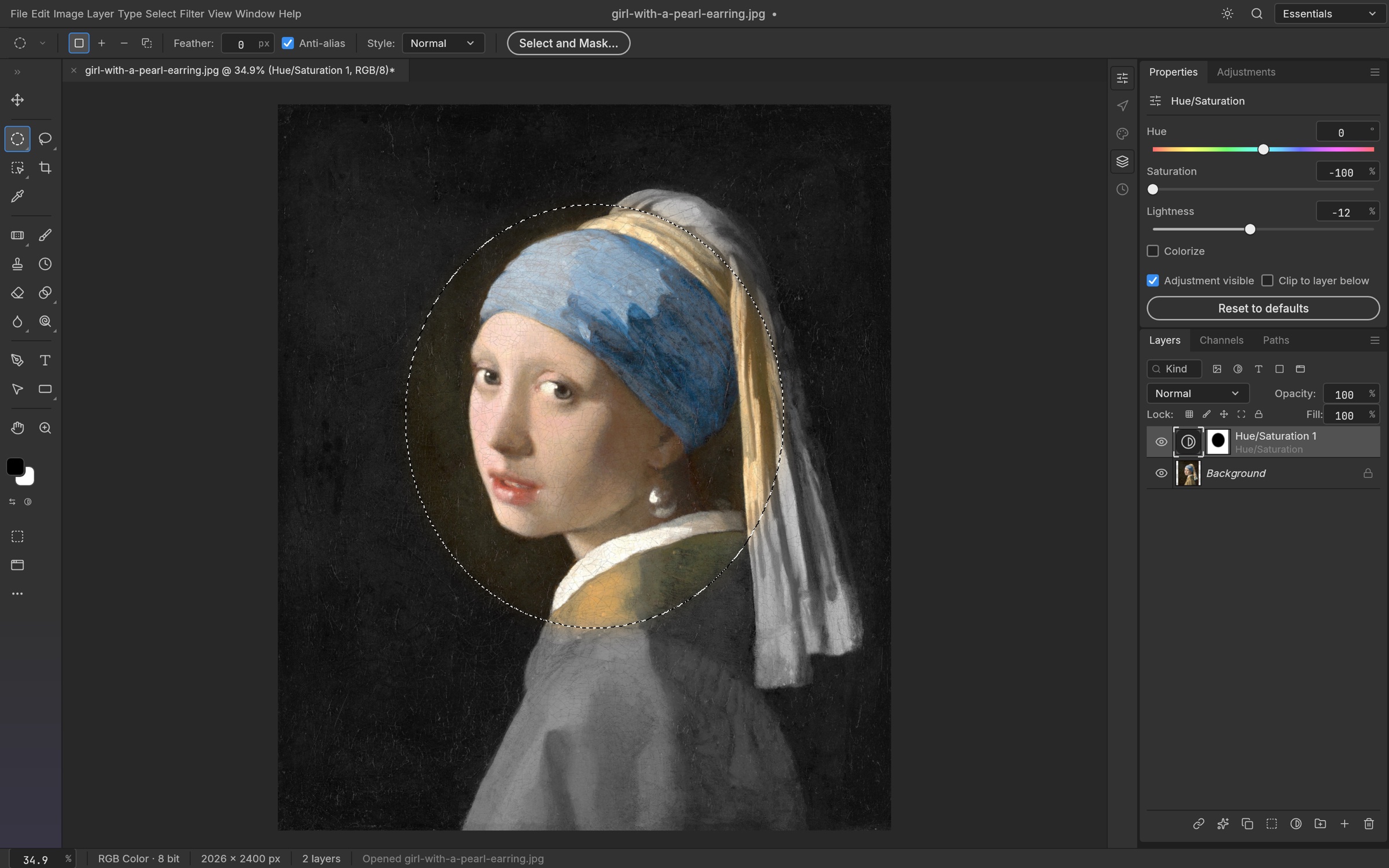 Vermeer's Girl with a Pearl Earring: an elliptical selection around the face, and a Hue/Saturation layer with an elliptical mask that turns everything outside the face gray