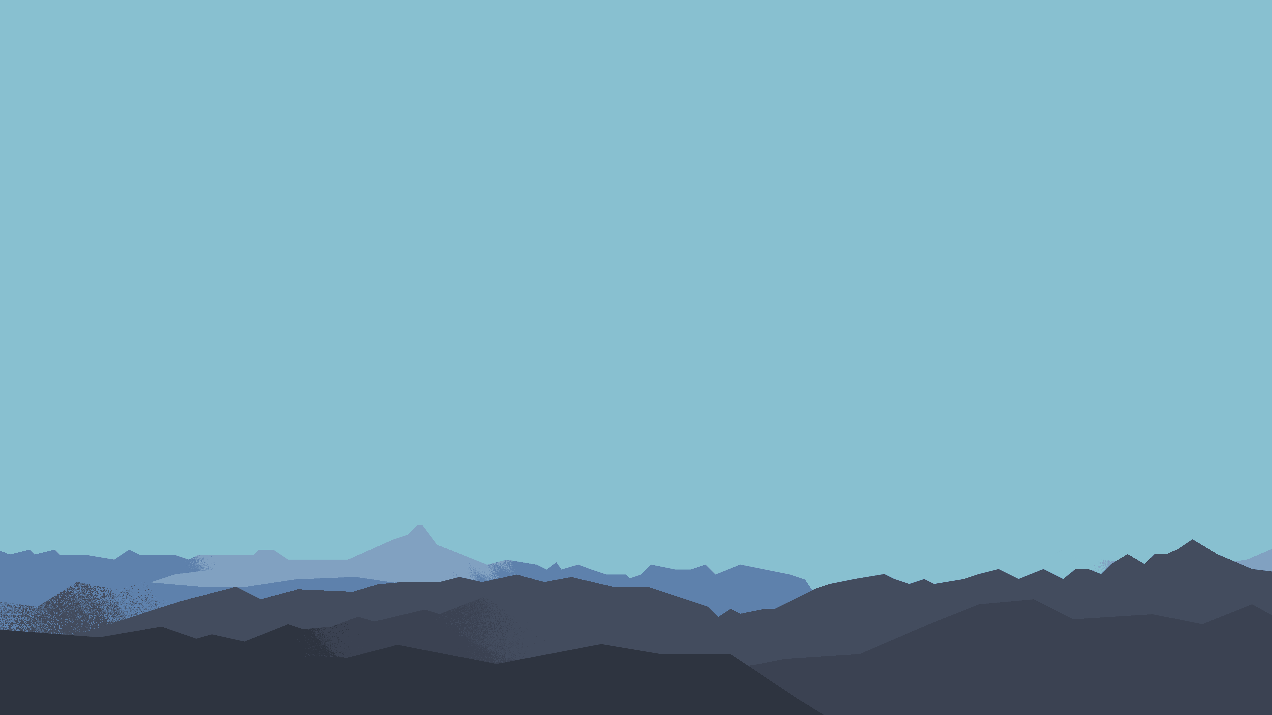 a blue sky over a mountain range