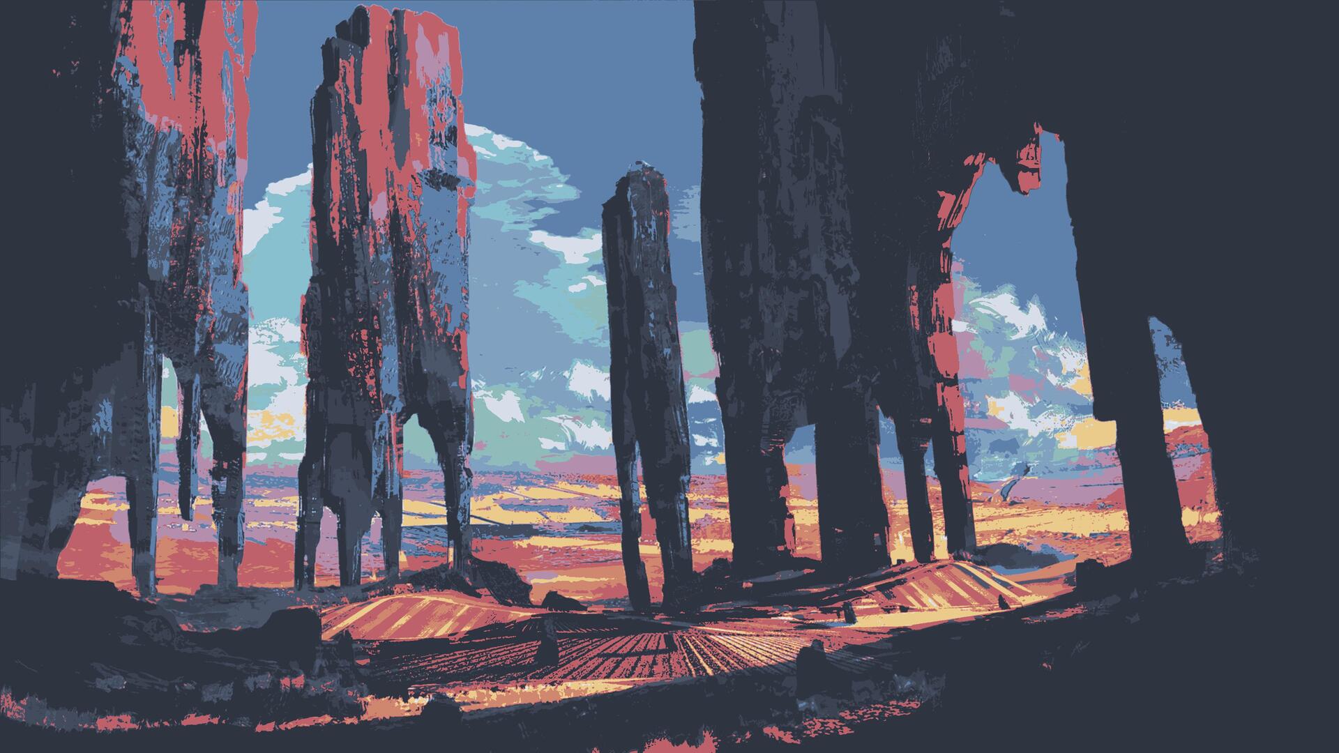 a group of tall pillars in a desert
