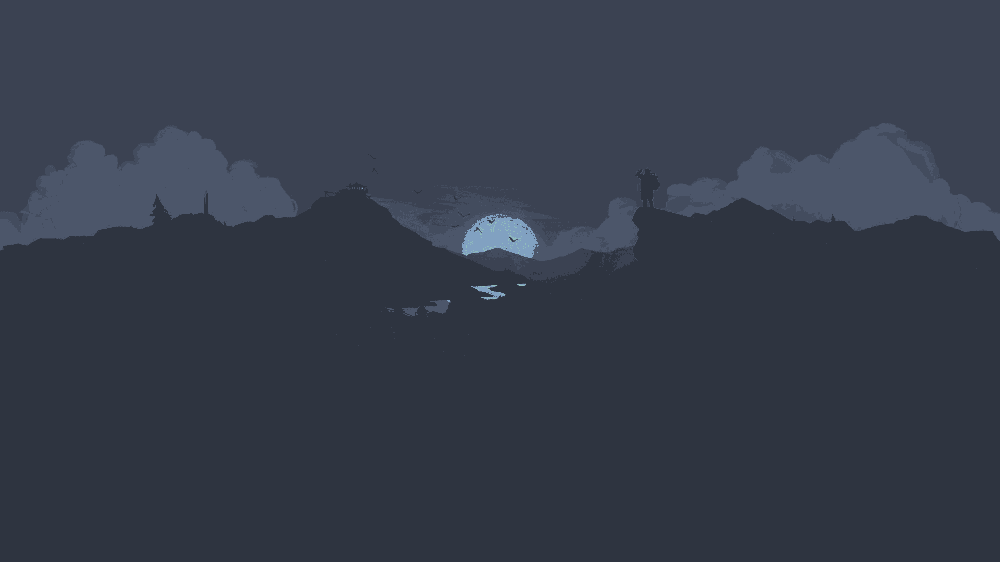 a moon over mountains and clouds