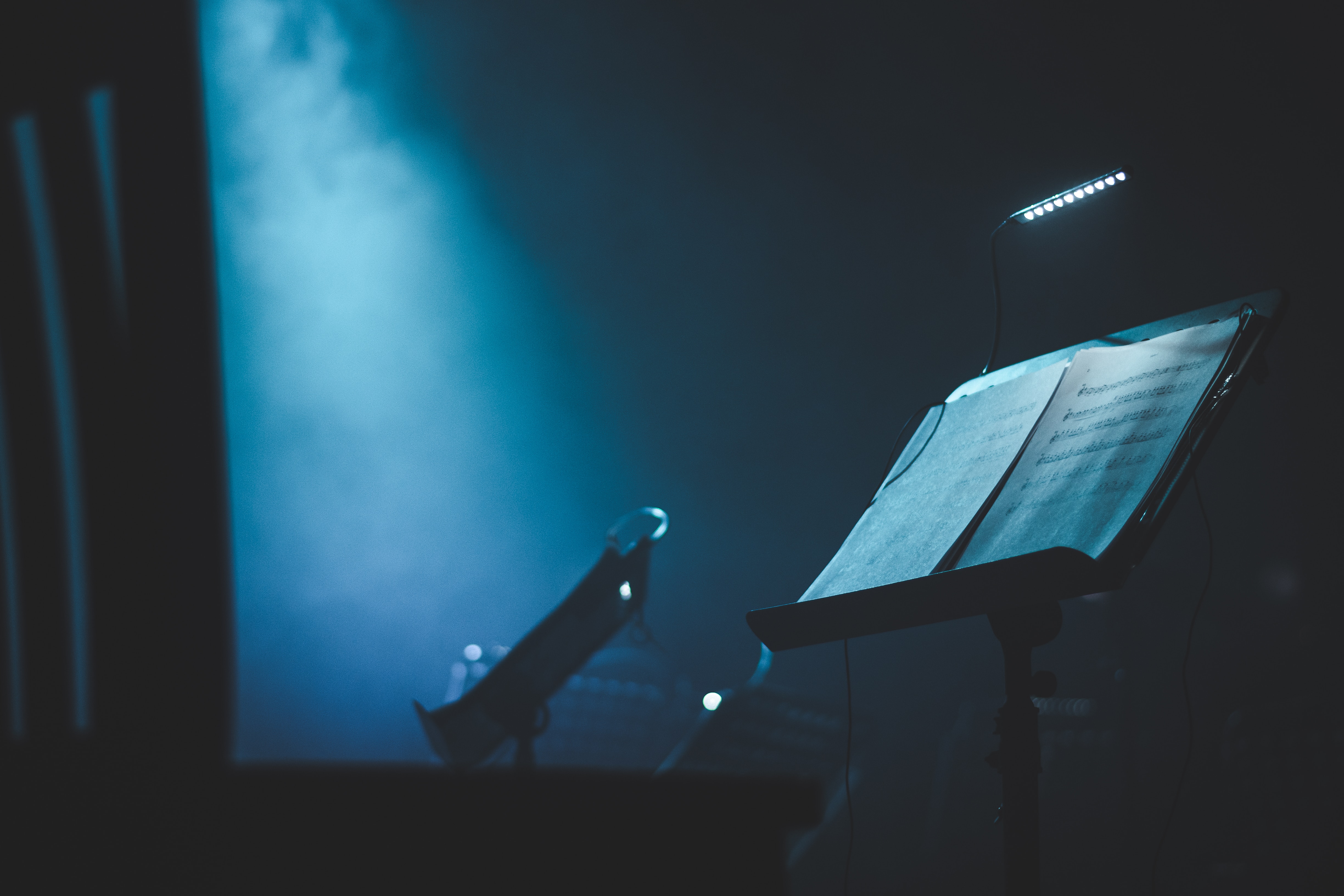 a music stand with a book on it