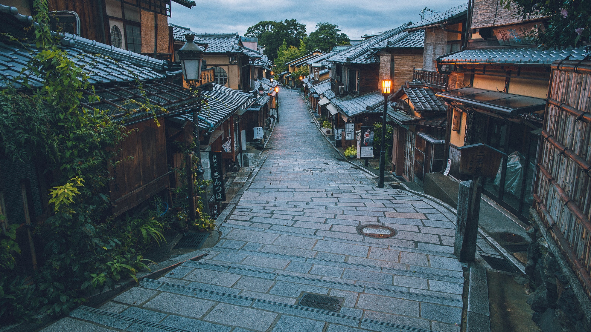 a street with buildings and a street light